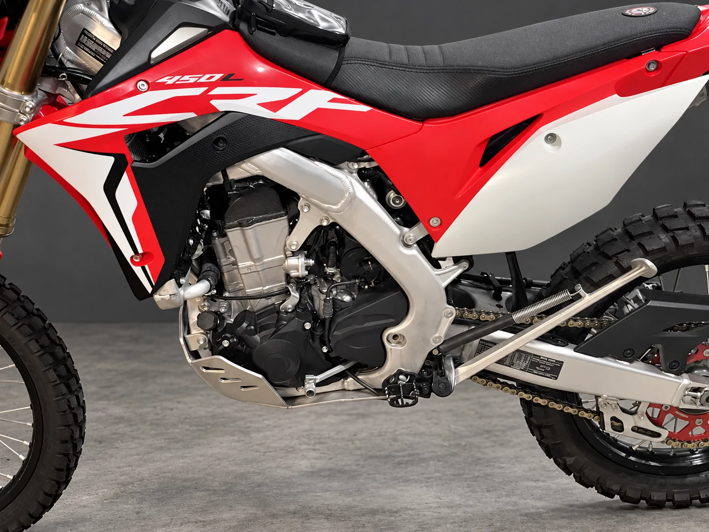 CRF450L engine, frame and Seat Concepts seat in the garage