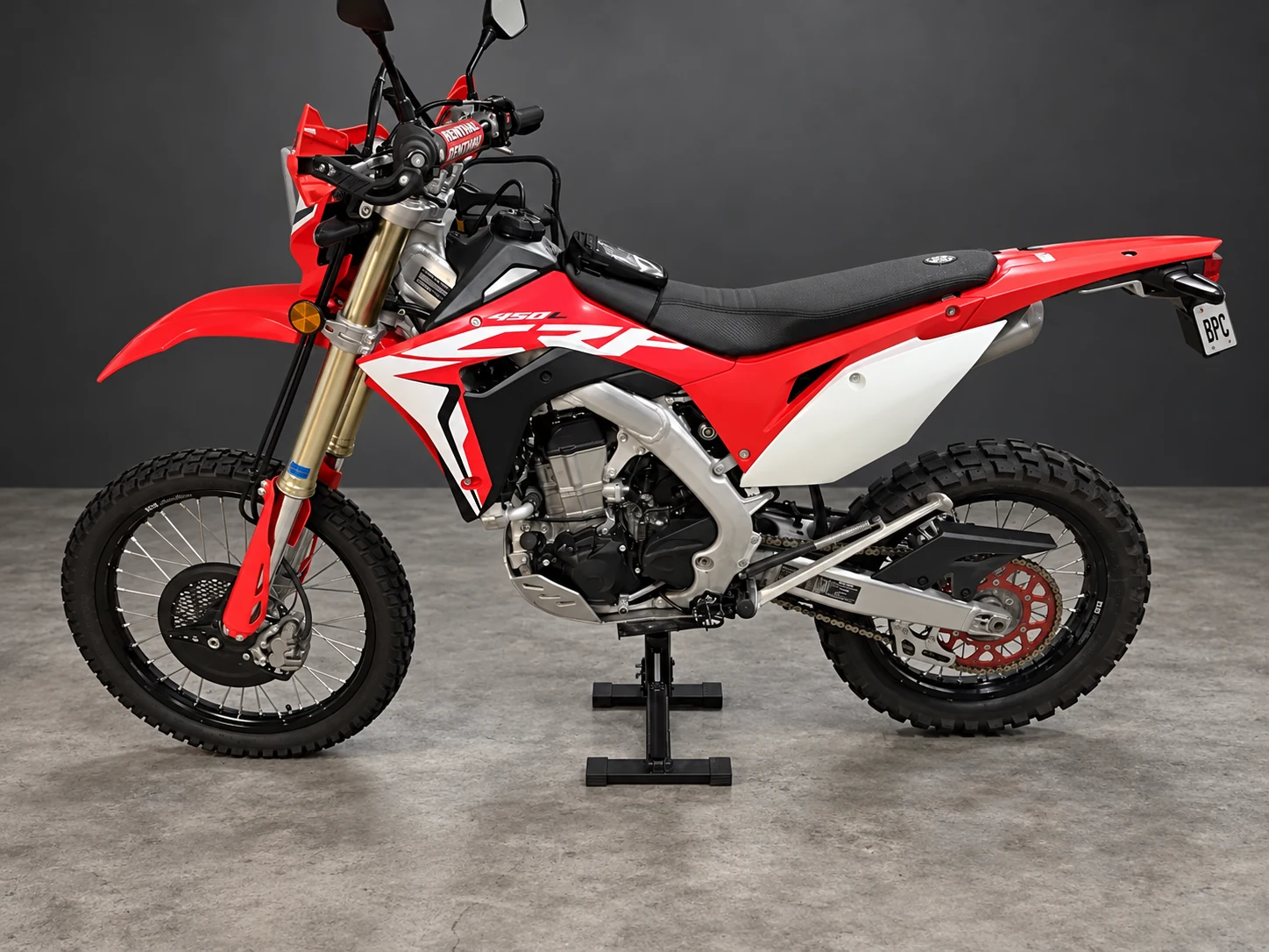 Left side of the CRF450L on its workshop stand